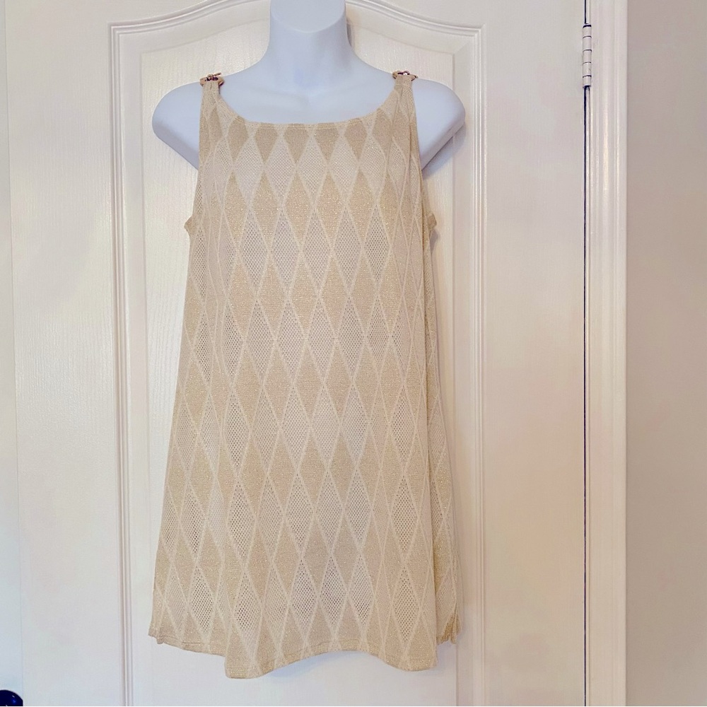 Sparkly top with 3 gold rings at shoulders